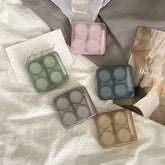 Farbiger Kontaktlinsenbehälter im Sommer-Französischen Stil