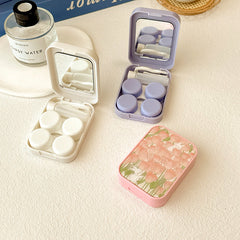 Zee van bloesems gekleurd contactlens.